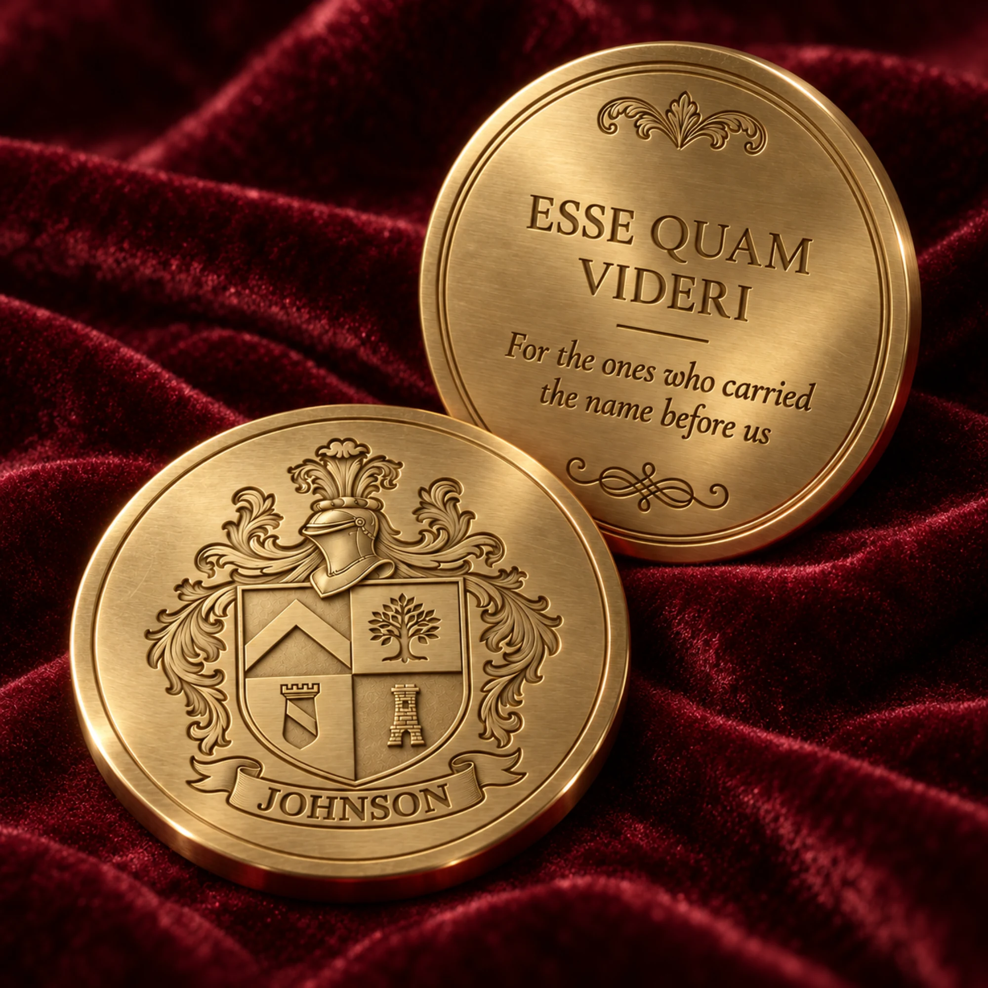 Front and back of the gold coat of arms medallion showing the crest and the engraved family motto