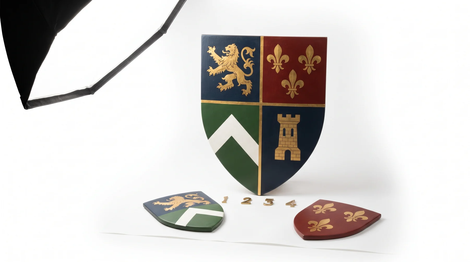 A quartered shield standing behind the two smaller shields it was assembled from, with brass numerals marking the four quarters